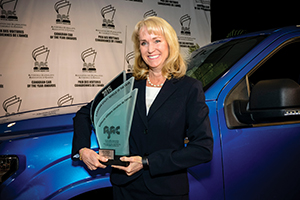 Dianne Craig, President and CEO of Ford Canada with this year’s Canadian Utility Vehicle of the Year winner, the Ford F-150