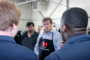 John Tory talks with students at the Brimell Paint and Collision Centre on Monday