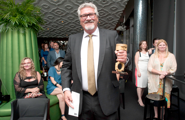 Dan McQueen, from Audi Downtown (Toronto) receives the award for Best Closing Ratio at the inaugural TradeRev Revvie Awards