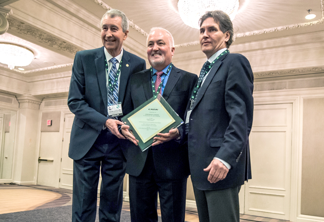 GM : Ron Loveys, Senior Past Chairman, CADA, Stephen Carlisle, President and Managing Director, General Motors of Canada, Tim Ryan, Director, Industry Relations and General Counsel, CADA.