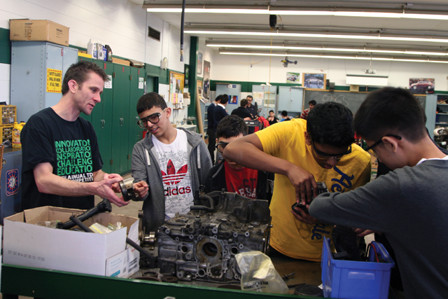 Joel McDonald teaches students at Agincourt Collegiate