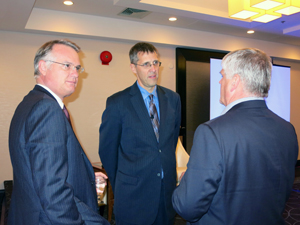 From left: Mercedes-Benz Canada President Tim Reuss, Niel Hiscox, President of Universus Media Group and Al McCormick, Vice-President, sales, Ford of Canada, chat prior to a panel discussion led by Hiscox on May 9 at the Manitoba Motor Dealers Association annual conference