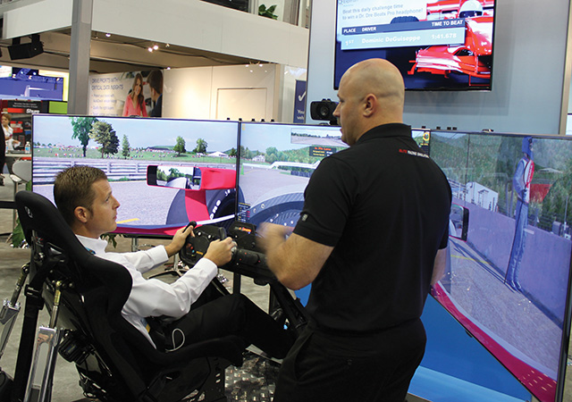 Exhibitors compete for attention from dealers with fun booths
