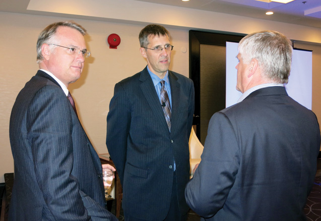 From left: Mercedes-Benz Canada President Tim Reuss, Niel Hiscox, President of Universus Media Group and Al McCormick, Vice-President, Sales, Ford of Canada, chat prior to a panel discussion led by Hiscox on May 9 at the Manitoba Motor Dealers Association annual conference