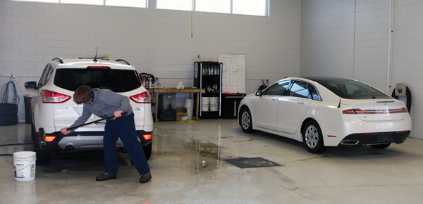 Dedicated detail bay can accommodate up to three vehicles and boasts heated floors
