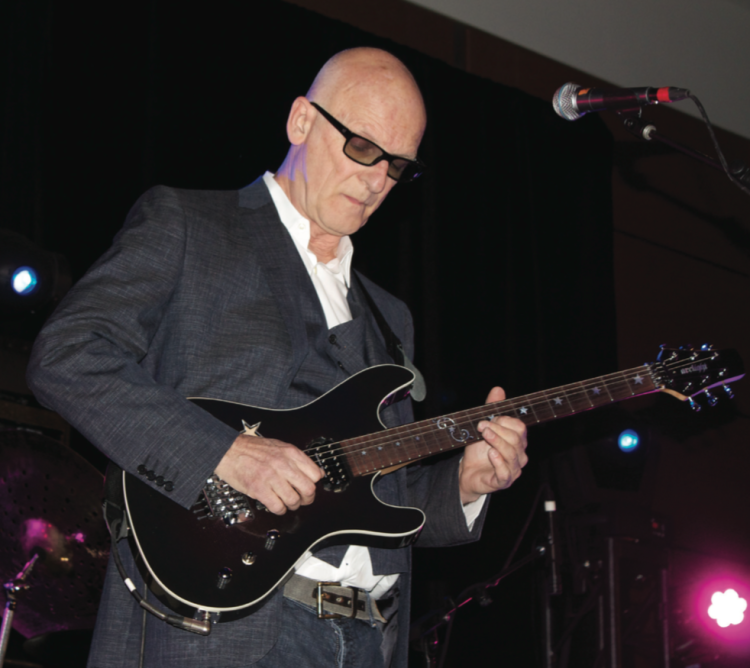 Canadian rock legend and founder of Max Webster, Kim Mitchell, took to the stage and played hit after hit.